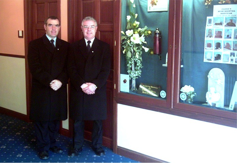 Pat & John Flood in the hallway of Flood Funeral Directors